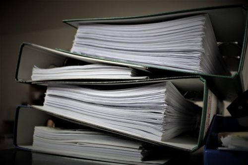black binders, paperwork, filing, stacked, binders stacked, closing cost, home owner